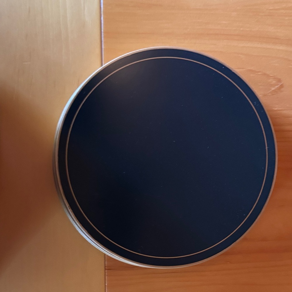 Elegant navy with gold round placemats by Pimpernel